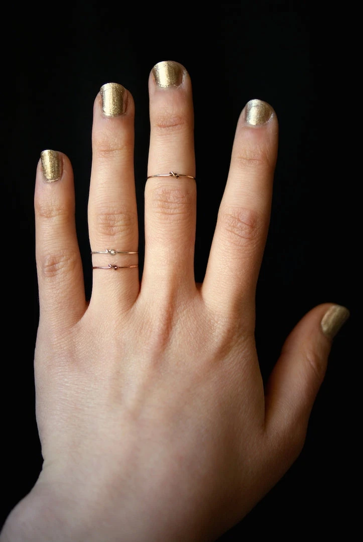 HANNAH NAOMI TINY KNOT RING NEW IN